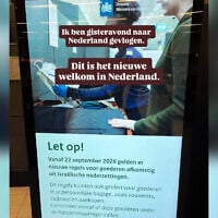 A sign at Amsterdam’s Schiphol Airport warns travelers that, as of September 22, 2026, new restrictions apply to goods originating in Israeli settlements, including items carried in personal luggage. (Instagram/neshimatrips)