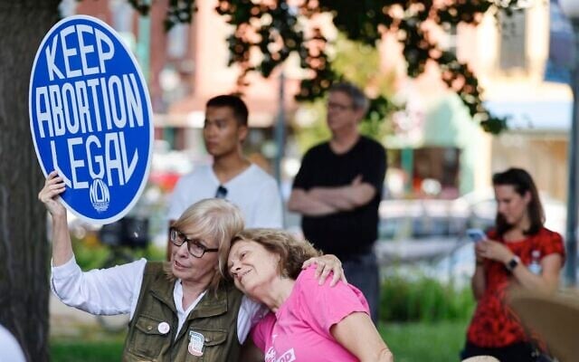 Demonstrators associated with Hoosier Jews for Choice gather outside the Monroe County Courthouse on July 31, 2023, before Indiana’s near total abortion ban began. (Jeremy Hogan/SOPA Images/LightRocket via Getty Images via JTA).