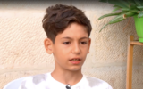William, a nine-year-old Armenian Christian boy from Jerusalem, who was pepper-sprayed by a Jewish extremist on Yom Kippur, speaks to Channel 13, in an interview aired September 26, 2026. (Screenshot)