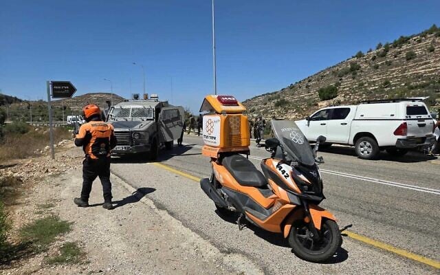 First responders at the scene of a shooting attack near the West Bank settlement of Neve Tzuf, also known as Halamish, September 20, 2026. (United Hatzalah) First responders at the scene of a shooting attack near the West Bank settlement of Neve Tzuf, also known as Halamish, September 20, 2026. (United Hatzalah)