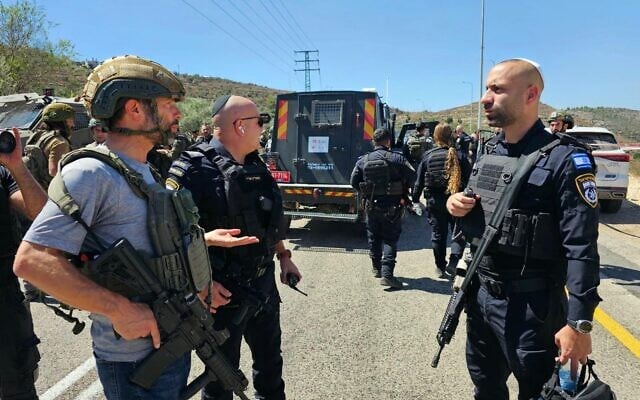 Yesha Council chief Israel Ganz (eft) at the site of a terror attack near the Neve Tzuf settlement in the West Bank, September 20, 2026. (Benjamin Regional Council) Yesha Council chief Israel Ganz (eft) at the site of a terror attack near the Neve Tzuf settlement in the West Bank, September 20, 2026. (Benjamin Regional Council)