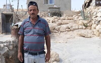 Nabil Jabarin stands in the West Bank Palestinian hamlet of Jinba in the Masafer Yatta region where he lives, September 24, 2026. (Courtesy) Nabil Jabarin stands in the West Bank Palestinian hamlet of Jinba in the Masafer Yatta region where he lives, September 24, 2026. (Courtesy)
