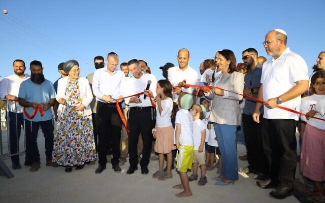 Finance Minister Bezalel Smotrich, Justice Minister Yariv Levin, Science Minister Gila Gamliel, Settlements Minister Orit Strock, and other dignitaries inaugurate two new settlements in the southern West Bank region, September 27, 2026. (Eitam Shalem)