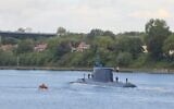 The Israeli Navy's INS Drakon submarine makes its way through Germany, en route to Israel, in a handout photo published on September 23, 2026. (Israel Defense Forces)