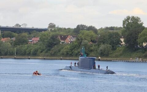 The Israeli Navy's INS Drakon submarine makes its way through Germany, en route to Israel, in a handout photo published on September 23, 2026. (Israel Defense Forces)