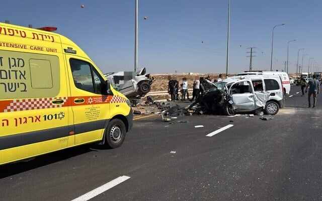 A Magen David Adom ambulance stands in front of two vehicles that crashed into each other on Route 310 in southern Israel on September 17, 2026. (Magen David Adom)
