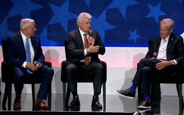 Rep. Mike Collins, a Georgia Republican (C), speaks with RJC National Chairman Senator Norm Coleman (R) on the stage of the Republican Jewish Coalition’s annual convention in Las Vegas, August 31, 2026. (RJC/X)