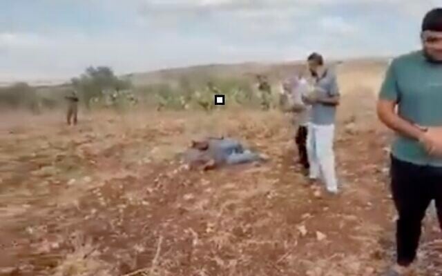 A man lies on the ground after he was shot in the leg by an IDF soldier on the outskirts of the Palestinian village of Faqoua, near Jenin, Septemebr 12, 2026 (Screen grab/used in accordance with Clause 27a of the Copyright Law)
