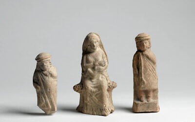 Hellenistic figurines depicting a child, a woman suckling an infant, and a youth. Courtesy of the Israel Antiquities Authority (Meidad Suchowolski/Israel Museum) Hellenistic figurines depicting a child, a woman suckling an infant, and a youth. Courtesy of the Israel Antiquities Authority (Meidad Suchowolski/Israel Museum)