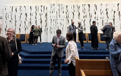 Congregants meet at congregation Beth El to say farewell to “The White Flame of the Six Million," a sculpture by storied artist Louise Nevelson that functioned as a bimah, in Great Neck, N.Y., October 1, 2026. (Michelle Falkenstein/JTA)