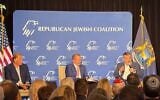 (L-r) Michigan GOP US Senate candidate Mike Rogers, Jewish Republican strategist Jeff Miller and Texas GOP US Senator Ted Cruz appear at a Republican Jewish Coalition event in Birmingham, Michigan, October 28, 2026. (Andrew Lapin/JTA)
