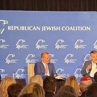 (L-r) Michigan GOP US Senate candidate Mike Rogers, Jewish Republican strategist Jeff Miller and Texas GOP US Senator Ted Cruz appear at a Republican Jewish Coalition event in Birmingham, Michigan, October 28, 2026. (Andrew Lapin/JTA)