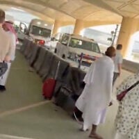 An ambulance is parked outside King Khalid International Airport after several people were killed and wounded in an attack on the airport that forced a suspension of operations, according to Saudi Arabia's civil aviation authority, in Riyadh, Saudi Arabia, October 10, 2026, in this screengrab obtained from social media video. (Social Media/via Reuters)
