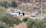 Vehicles at the site where Belgium's foreign minister says masked settlers attacked Western diplomats and officials near Taybeh, in the West Bank, on October 17, 2026. (Emad Diab/via REUTERS)