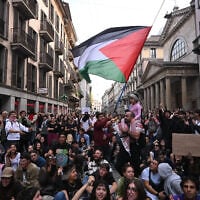 Protesters, including peo-Palestinians, clash with police during a demonstration against the rising cost of living and in support of better living conditions, on October 17, 2026 in Milan, Italy. (Stringer/Anadolu via Reuters)