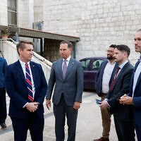 US Assistant Secretary of State for Democracy, Human Rights and Labor Riley Barnes and US Ambassador to the Holy See Brian Burch visit the Christian Palestinian village of Taybeh near Ramallah, a day after Israeli settlers attacked a French mayor and European diplomats during the olive harvest, in the West Bank, October 18, 2026. (Mohamad Torokman/ Reuters)