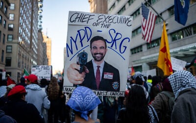 An anti-Zionist protester demonstrates against New York City Mayor Zohran Mamdani, in New York City, October 7, 2026. (Luke Tress/Times of Israel) An anti-Zionist protester demonstrates against New York City Mayor Zohran Mamdani, in New York City, October 7, 2026. (Luke Tress/Times of Israel)