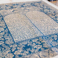 A recovered parochet (Torah ark curtain) stolen by the Nazis is brought back to the Berlin Jewish community, in an undated photo. (Nicolai Froundjian via JTA)