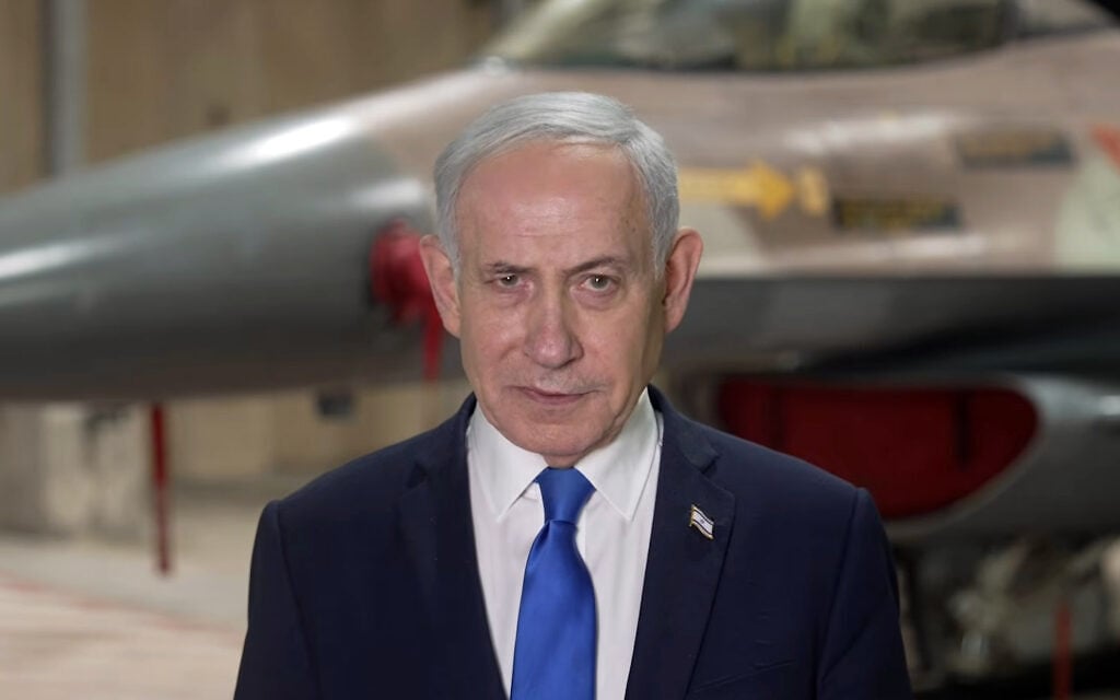 Prime Minister Benjamin Netanyahu speaks from an unnamed airbase in Israel, October 19, 2026. (Screenshot/PMO) Prime Minister Benjamin Netanyahu speaks from an unnamed airbase in Israel, October 19, 2026. (Screenshot/PMO)