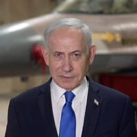 Prime Minister Benjamin Netanyahu speaks from an unnamed airbase in Israel, October 19, 2026. (Screenshot/PMO)