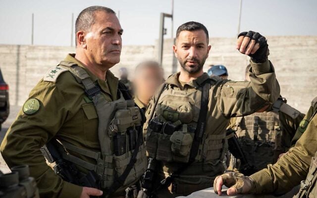 IDF Chief of Staff Lt. Gen. Eyal Zamir (left) meets with officers at the scene of a shooting attack near Hebron in the West Bank, October 23, 2026. (Israel Defense Forces)