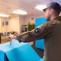 IDF soldiers vote at a mobile voting booth for Israel's national elections aboard a missile boat off the coast of Eilat in southern Israel, October 21, 2026. (Israel Defense Forces)