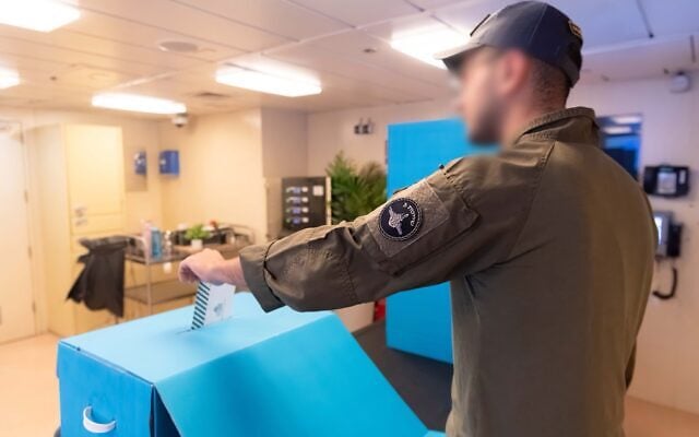 IDF soldiers vote at a mobile voting booth for Israel's national elections aboard a missile boat off the coast of Eilat in southern Israel, October 21, 2026. (Israel Defense Forces)