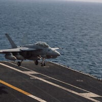 An F/A-18 Super Hornet attached to Strike Fighter Squadron (VFA) 195 lands aboard Nimitz-class aircraft carrier USS George Washington (CVN 73), October 1, 2026, in the Middle East. (U.S. Navy photo)