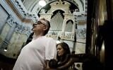 Italian tenor Andrea Bocelli sings in the Church of S. Saviour in the Old City of Jerusalem on June 13, 2011. (Alessio Romenzi/AFP)