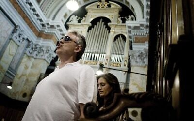 Italian tenor Andrea Bocelli sings in the Church of S. Saviour in the Old City of Jerusalem on June 13, 2011. (Alessio Romenzi/AFP)