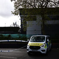 A police van is parked outside of a warehouse park housing offices of a the Persian-language TV station, Iran International, in Wembley, northwest London on April 16, 2026. (Henry NICHOLLS/AFP)