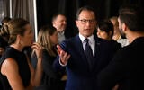 Pennsylvania Gov. Josh Shapiro speaks to AI executives backstage before delivering a keynote speech during the AI Horizons Summit at Bakery Square on September 17, 2026 in Pittsburgh, Pennsylvania. (Jeff Swensen/Getty Images/AFP)
