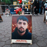 PIctures of protesters who were killed by the Iranian state security forces during the nationwide anti-government demonstrations that took place in Iran in January, are seen during a Free Iran Rally outside of the United Nations General Assembly on September 22, 2026 in New York City. (Ryan Murphy/Getty Images/AFP)