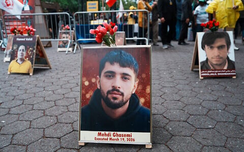 PIctures of protesters who were killed by the Iranian state security forces during the nationwide anti-government demonstrations that took place in Iran in January, are seen during a Free Iran Rally outside of the United Nations General Assembly on September 22, 2026 in New York City. (Ryan Murphy/Getty Images/AFP)