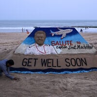 A sculpture made by India’s sand artist Sudarsan Pattnaik depicts India’s pilot Smit Machchhar, the captain of flydubai flight FZ 1073, at a beach in Odisha’s Puri city on October 1, 2026. (AFP)