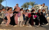 Displaced children from the Gaza Strip, stand in line as they attend a Palestinian school in the Egyptian city of El-Arish, near the border with the Gaza Strip, on October 1, 2026. (Amr AHMED/AFP)