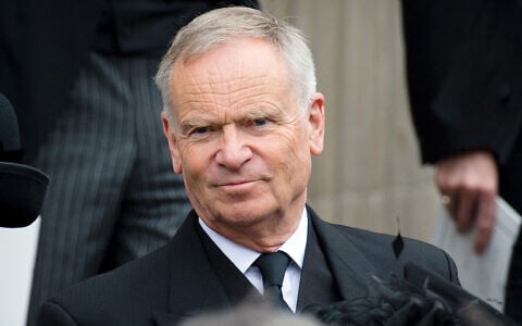 FILE: British author and former MP Jeffrey Archer leaves St Paul’s Cathedral at the end of British former prime minister Margaret Thatcher's ceremonial funeral in central London on April 17, 2013. (LEON NEAL/AFP)