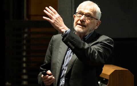 This handout photo taken on April 13, 2023, and released on October 6, 2026, shows Francis Halzen, UW–Madison Vilas Research Professor, speaking about the UW IceCube Neutrino Observatory Project at the University of Wisconsin-Madison. (Bryce RICHTER/University of Wisconsin/AFP)