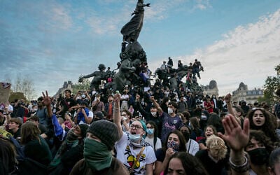 People gather on and around the statue in the center of the Place de la Republic square at the end of a demonstration part of a nationwide day of actions called by high-school students, joined by unions and teachers, who for days have been demanding better learning conditions in protests punctuated by violent confrontations in Paris on October 6, 2026. (Dimitar DILKOFF/AFP) People gather on and around the statue in the center of the Place de la Republic square at the end of a demonstration part of a nationwide day of actions called by high-school students, joined by unions and teachers, who for days have been demanding better learning conditions in protests punctuated by violent confrontations in Paris on October 6, 2026. (Dimitar DILKOFF/AFP)
