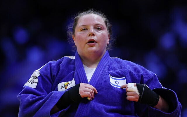 Israel’s Raz Hershko reacts after winning the women’s over 78 kg bronze medal bout at the World Judo Championships in Baku, Azerbaijan, on October 10, 2026. (Anne-Christine POUJOULAT/AFP)