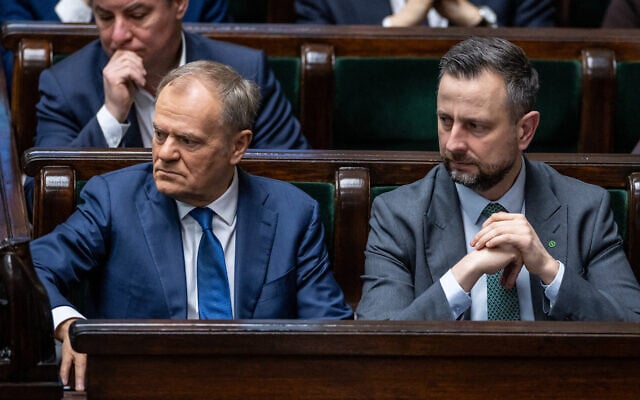 (L-R) Poland’s Prime Minister Donald Tusk and Poland’s Deputy Prime Minister and Minister of Defense Wladyslaw Kosiniak-Kamysz attend a session of parliament in Warsaw on February 26, 2026. (Wojtek RADWANSKI/AFP) (L-R) Poland’s Prime Minister Donald Tusk and Poland’s Deputy Prime Minister and Minister of Defense Wladyslaw Kosiniak-Kamysz attend a session of parliament in Warsaw on February 26, 2026. (Wojtek RADWANSKI/AFP)