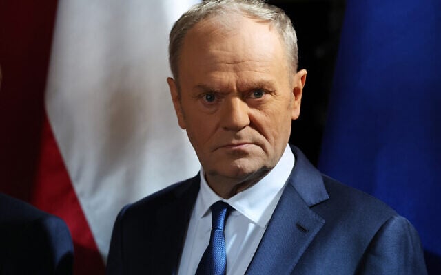 Polish Prime Minister Donald Tusk looks on during the signing of agreements between Poland and France at the Main Town Hall in Gdansk, Poland, on April 20, 2026. (Ludovic MARIN/AFP)