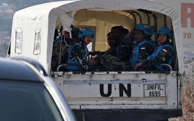 Members of the Indonesian contingent of the United Nations Interim Force in Lebanon (UNIFIL) ride in a vehicle in Lebanon’s southern border village of Ibl al-Saqi on October 13, 2026. (Joseph EID/AFP) Members of the Indonesian contingent of the United Nations Interim Force in Lebanon (UNIFIL) ride in a vehicle in Lebanon’s southern border village of Ibl al-Saqi on October 13, 2026. (Joseph EID/AFP)