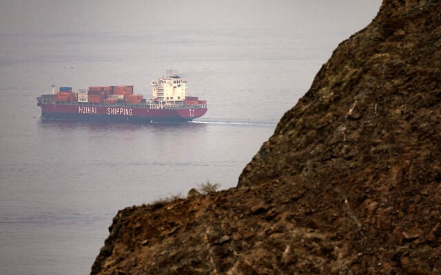 FILE: The Chinese-flagged container shipping vessel Hui Fa transits the Gulf of Oman off the coast of Khor Fakkan in the emirate of Sharjah in the east of the UAE on October 13, 2026. (AFP) FILE: The Chinese-flagged container shipping vessel Hui Fa transits the Gulf of Oman off the coast of Khor Fakkan in the emirate of Sharjah in the east of the UAE on October 13, 2026. (AFP)