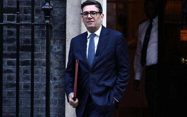 Britain’s Prime Minister Andy Burnham leaves 10 Downing Street in central London on October 14, 2026, to take part in the weekly session of ‘Prime Minister’s Questions’ (PMQs) at the parliament. (Henry NICHOLLS/AFP) Britain’s Prime Minister Andy Burnham leaves 10 Downing Street in central London on October 14, 2026, to take part in the weekly session of ‘Prime Minister’s Questions’ (PMQs) at the parliament. (Henry NICHOLLS/AFP)