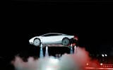 A grab taken on October 16, 2026 from a live feed released by Tesla shows the company unveiling on October 15 its next-generation Roadster electric car in McGregor, Texas, United States. (Tesla/AFP)