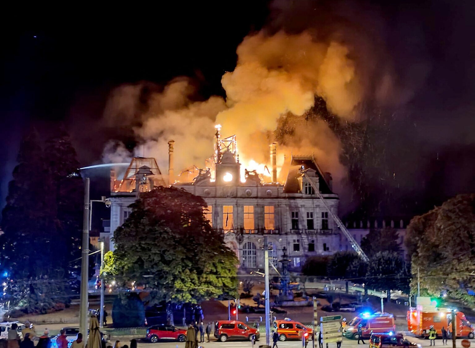 Fire burns and destroys the city hall after a group of individuals forced entry into the building during ongoing protest action against cost of living, in Limoges, central France, on October 17, 2026. (Melaine PAYZAL/AFP)