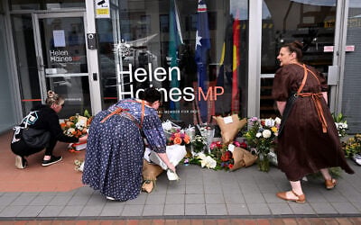 People lay flowers outside the office of Australian politician Helen Haines in the northern regional city of Wangaratta, some 250 kilometers north-east of Melbourne on October 20, 2026. (William West/AFP) People lay flowers outside the office of Australian politician Helen Haines in the northern regional city of Wangaratta, some 250 kilometers north-east of Melbourne on October 20, 2026. (William West/AFP)