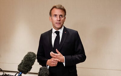 France’s President Emmanuel Macron speaks to members of the media on the day of the 9th Annual One Planet Sovereign Wealth Funds (OPSWF) Summit in Lusail on October 21, 2026. (Benoit Tessier/POOL/AFP)