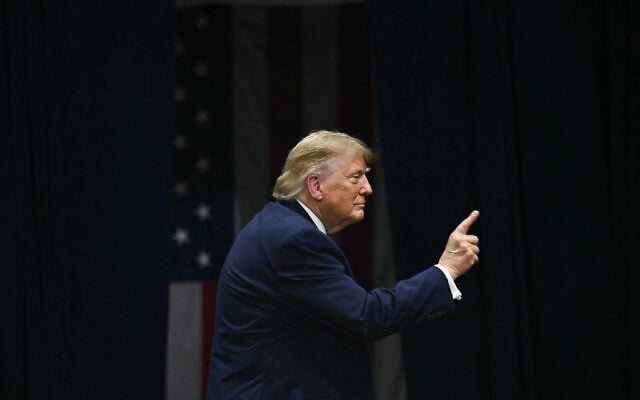 US President Donald Trump gestures to the crowd after speaking during a campaign rally at the Alico Arena, Florida Gulf Coast University in Fort Myers, Florida on October 23, 2026. (Brendan SMIALOWSKI/AFP) US President Donald Trump gestures to the crowd after speaking during a campaign rally at the Alico Arena, Florida Gulf Coast University in Fort Myers, Florida on October 23, 2026. (Brendan SMIALOWSKI/AFP)